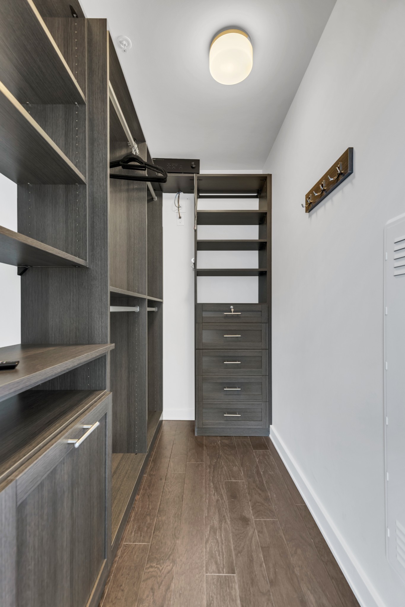 1212 Laurel Street, Unit 1815 Nashville, TN 37203 - Photo 19 of 42 a view of walk in closet with empty racks
