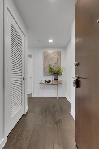 a view of kitchen with furniture and natural light