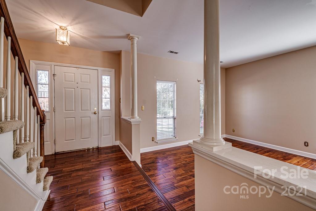 4511 Brownes Ferry Road Charlotte, NC 28269 - Photo 2 of 26 a view of front door with wooden floor