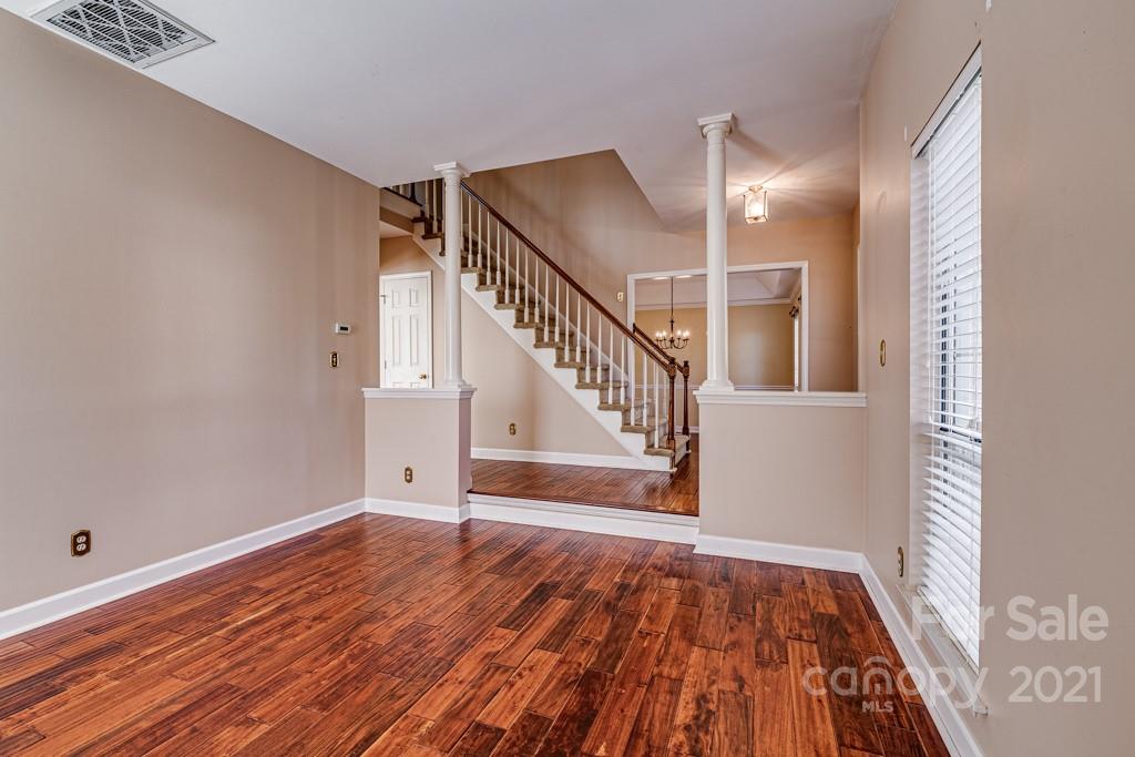4511 Brownes Ferry Road Charlotte, NC 28269 - Photo 3 of 26 a view of entryway with wooden floor