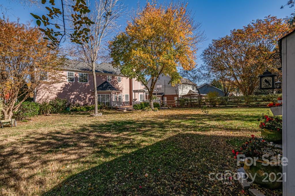4511 Brownes Ferry Road Charlotte, NC 28269 - Photo 24 of 26 a view of road with large trees