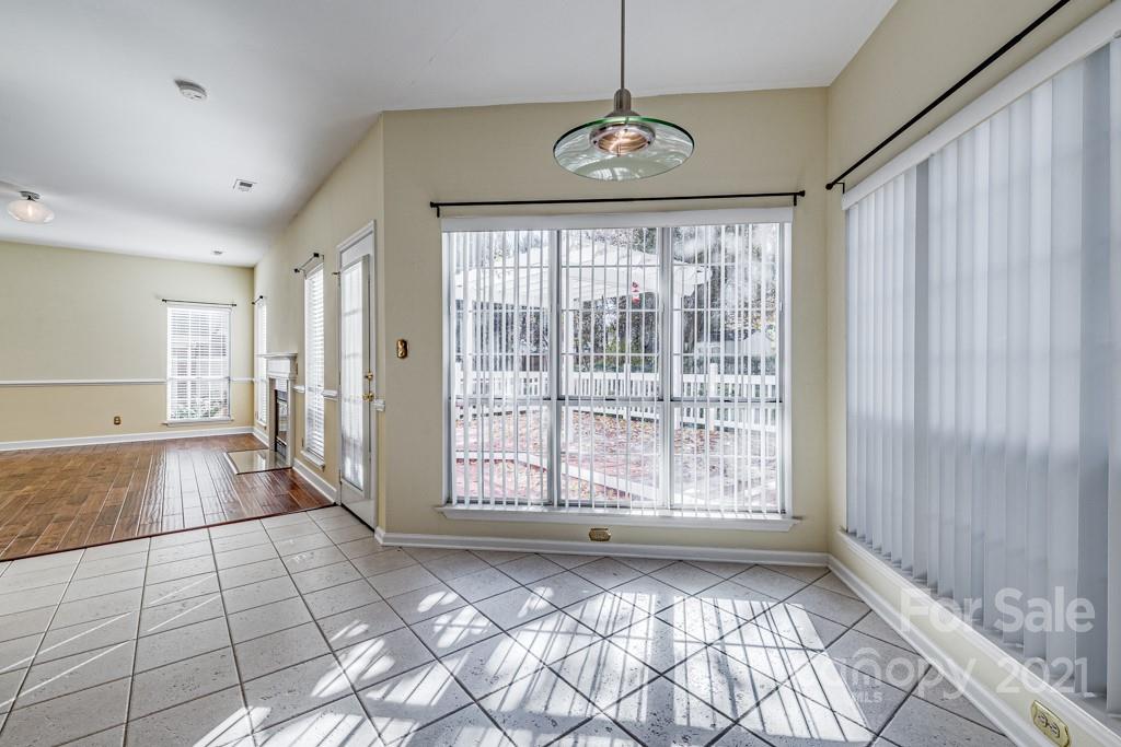 4511 Brownes Ferry Road Charlotte, NC 28269 - Photo 10 of 26 a view of an empty room with a window