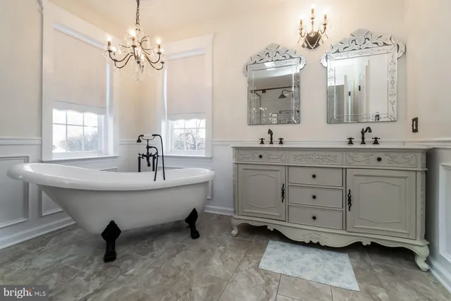 a living room with furniture fireplace and flat screen tv