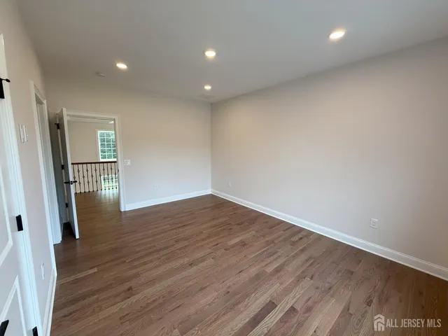 a bathroom with a sink a mirror and shower