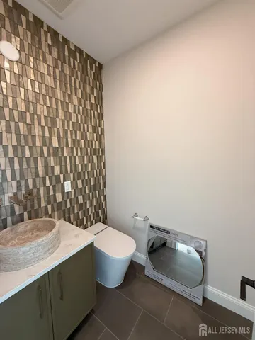 a view of a room with wooden floor and window