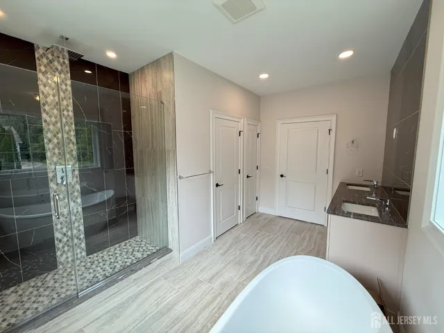 a picture of a bathroom with a sink