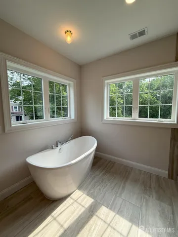 a view of a swimming pool with a garden