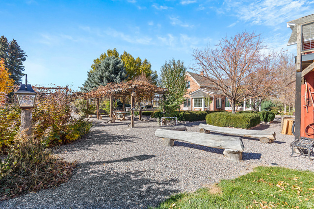 390 North 100 West Monroe, UT 84754 - Photo 45 of 167 View of community featuring a pergola and a patio area