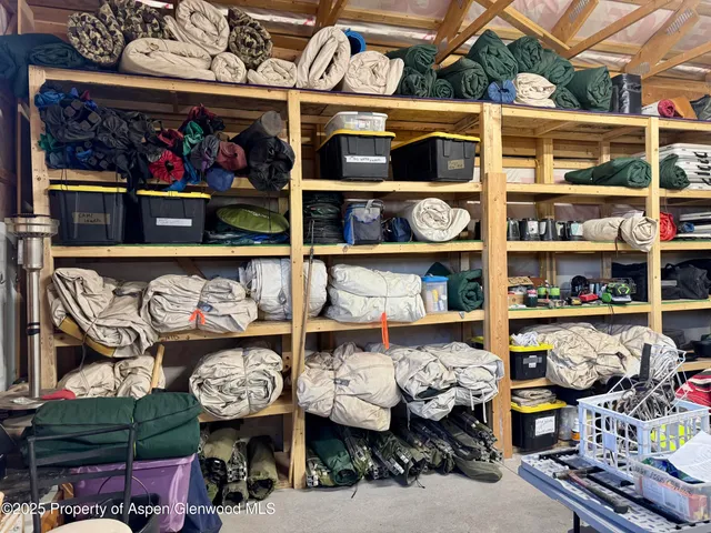 a view of outdoor space with wooden fence