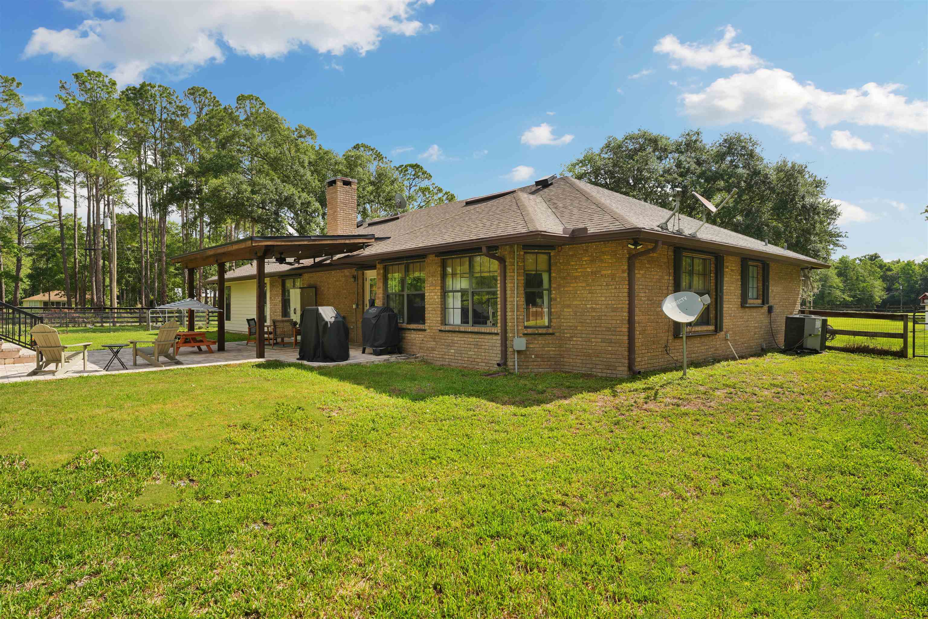 1805 Bennett Road St. Augustine, FL 32092 - Photo 42 of 65 a front view of a house with a yard