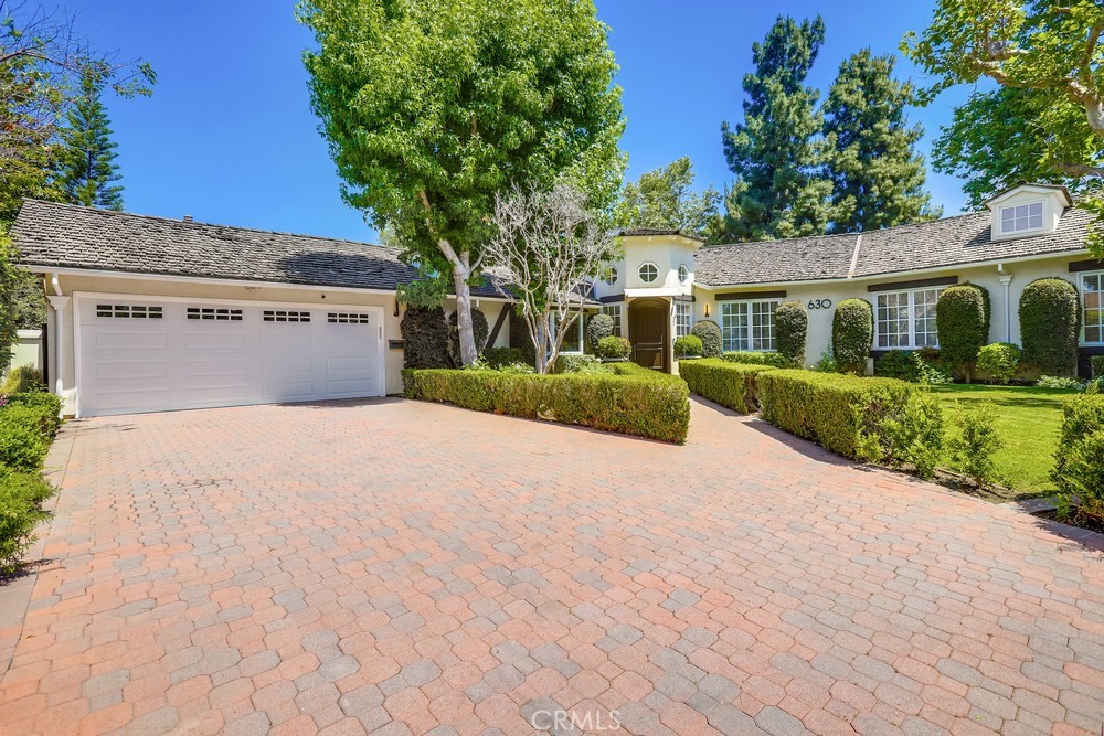 630 West Devon Place Long Beach, CA 90807 - Photo 2 of 49 a front view of a house with a yard and outdoor seating
