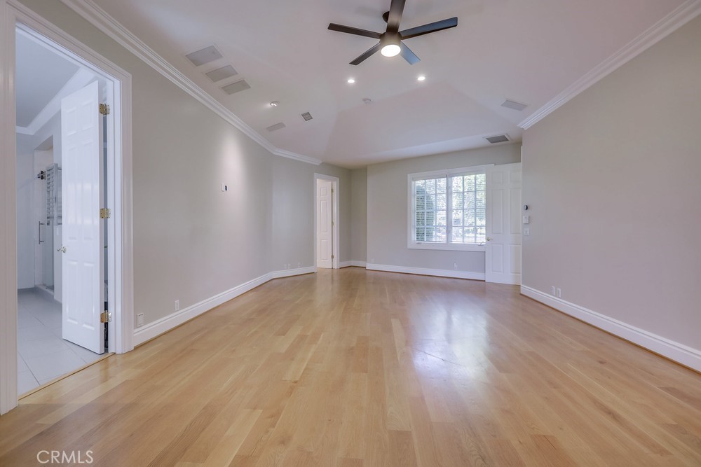 630 West Devon Place Long Beach, CA 90807 - Photo 30 of 49 a view of an empty room with a window and wooden floor