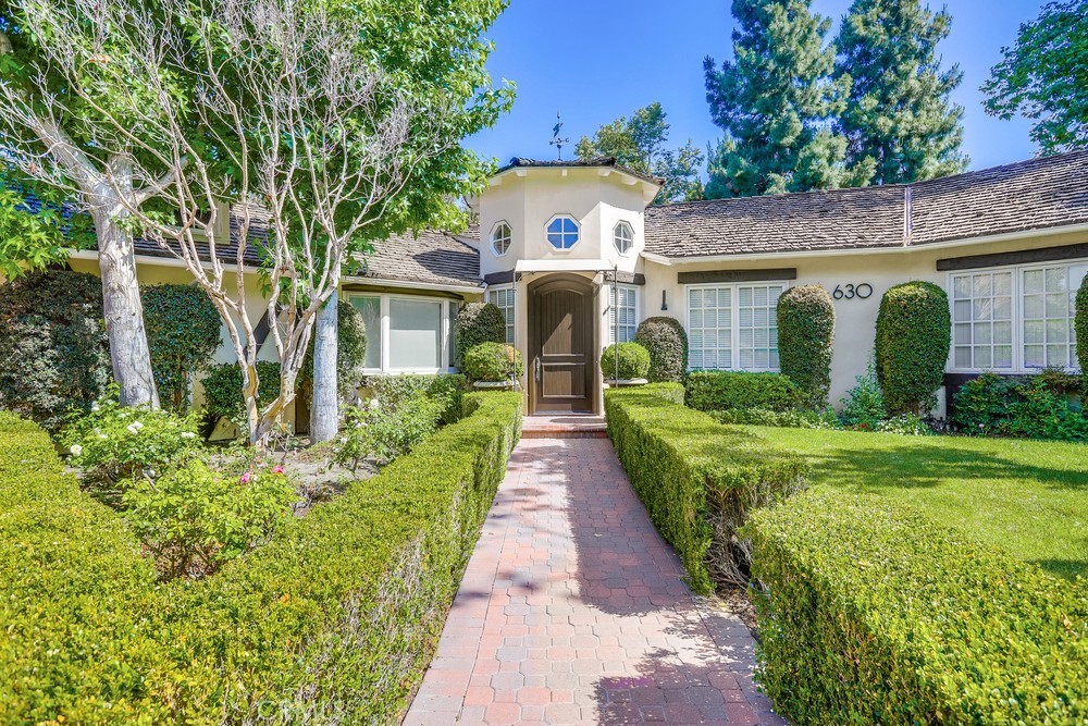 630 West Devon Place Long Beach, CA 90807 - Photo 3 of 49 front view of a house with a yard