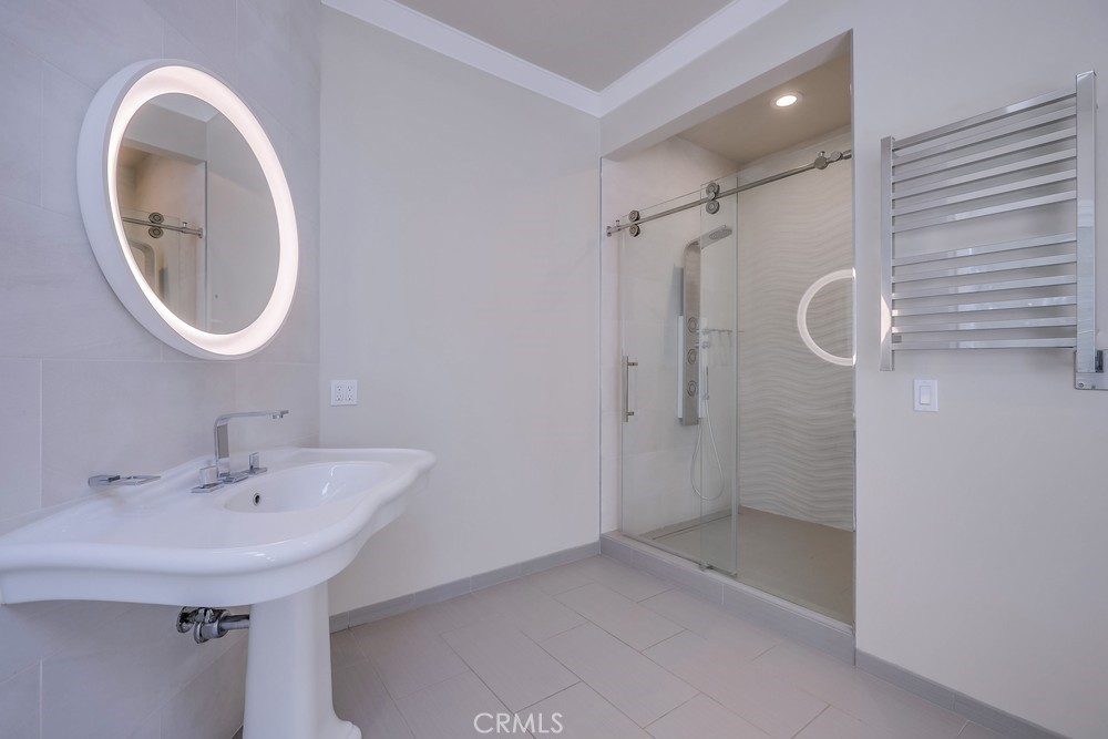 630 West Devon Place Long Beach, CA 90807 - Photo 33 of 49 a bathroom with a sink a toilet and shower