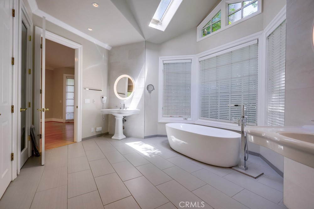 630 West Devon Place Long Beach, CA 90807 - Photo 34 of 49 a bathroom with a bathtub and a toilet