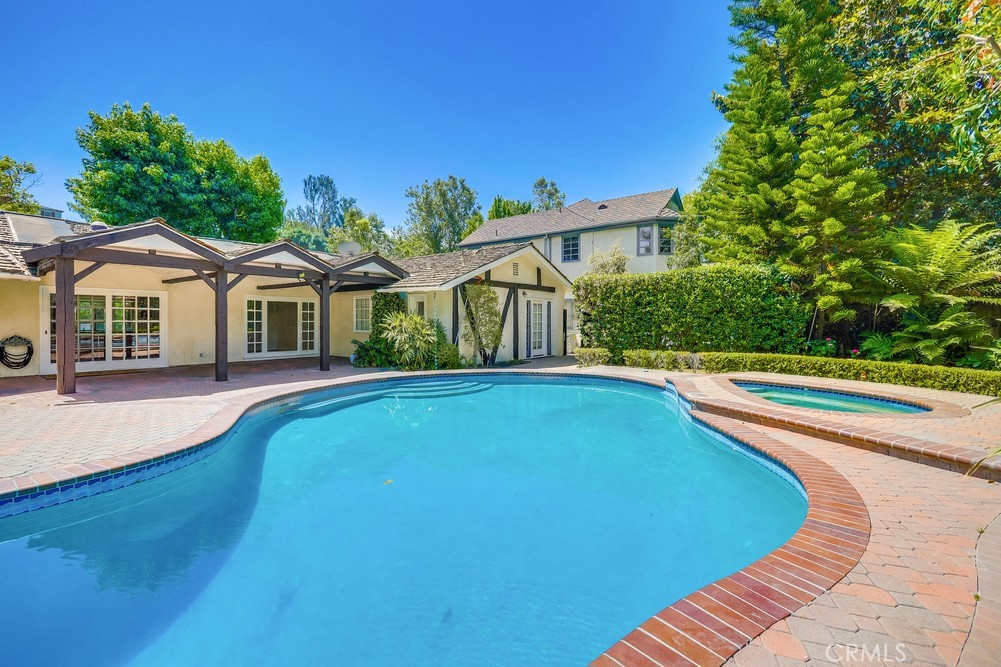 630 West Devon Place Long Beach, CA 90807 - Photo 45 of 49 a view of a house with swimming pool and yard