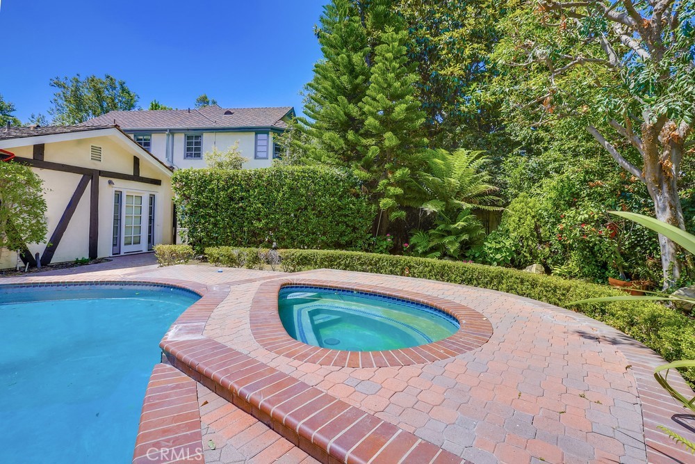 630 West Devon Place Long Beach, CA 90807 - Photo 46 of 49 a view of swimming pool with a backyard