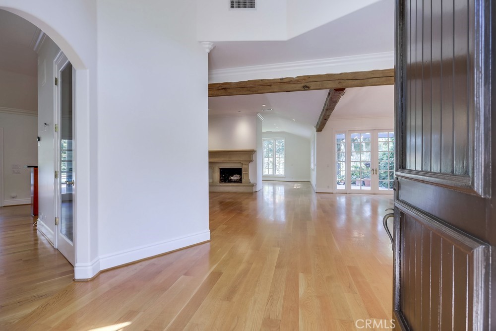 630 West Devon Place Long Beach, CA 90807 - Photo 5 of 49 a view of empty room with wooden floor and fan