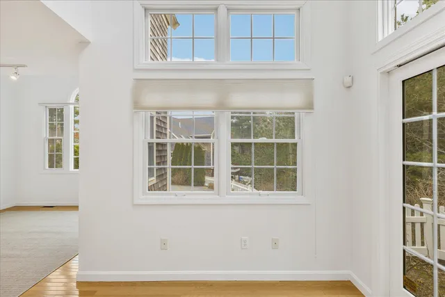 a view of a door and a window