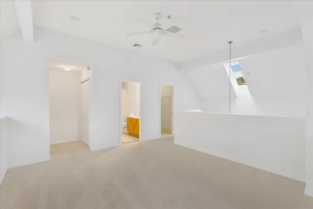 a view of a livingroom with a ceiling fan