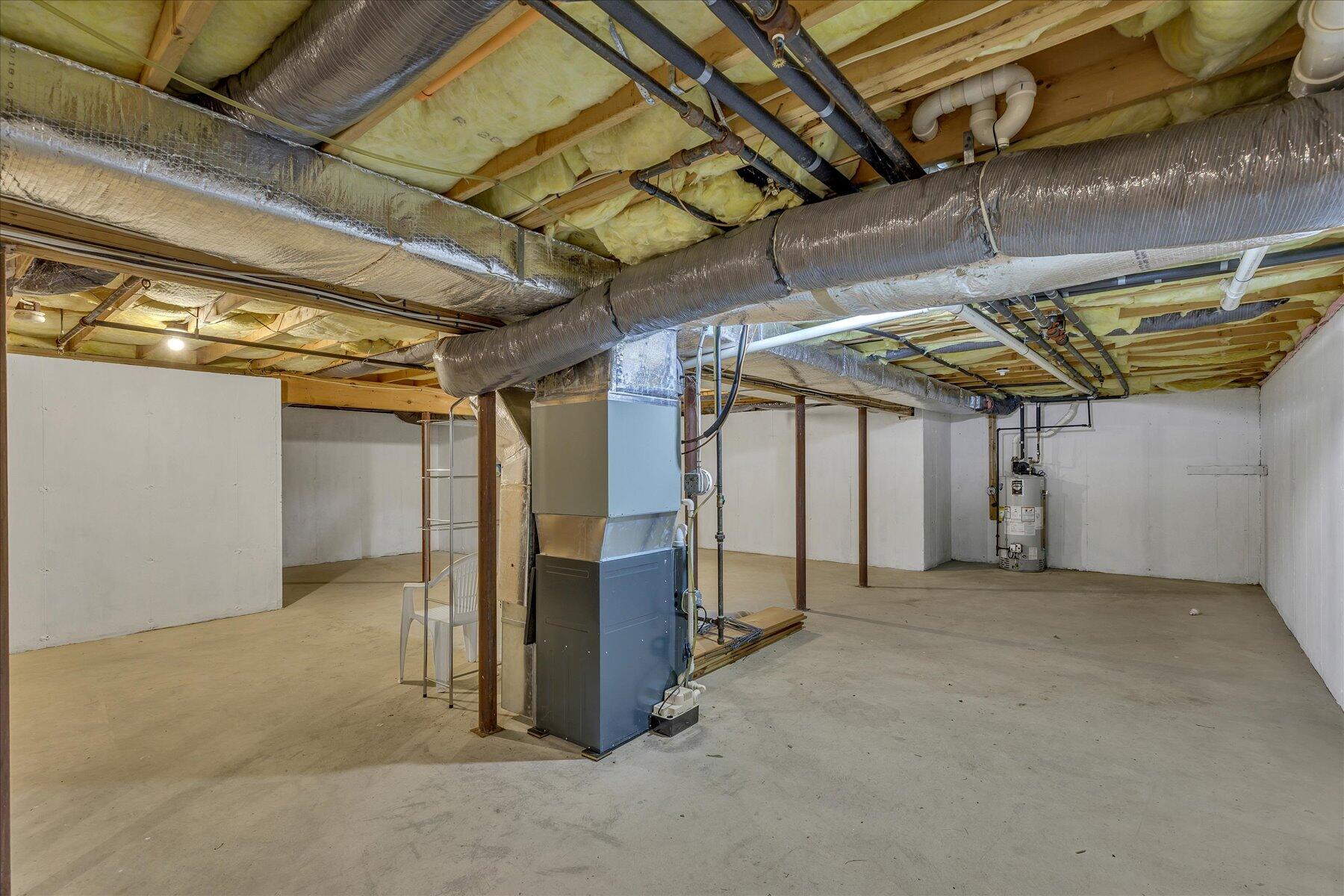 9 Red Cedar Road, Unit 9 Mashpee, MA 02649 - Photo 21 of 29 a view of a room with wooden walls