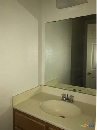 a bathroom with a sink and a bathtub
