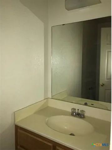 a bathroom with a sink and a bathtub