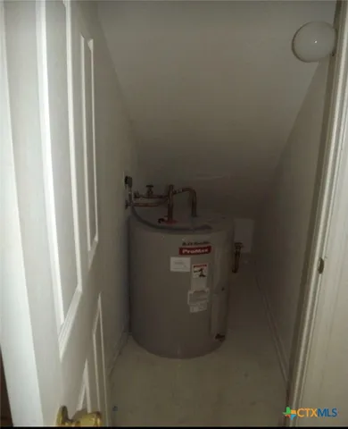 a view of a refrigerator in kitchen