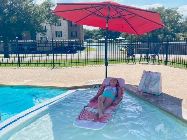 a view of a backyard with a sitting space