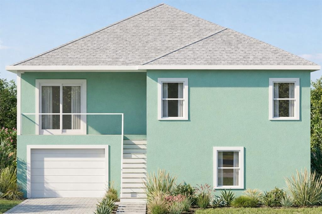 8133 Gulf Way Hudson, FL 34667 - Photo 2 of 10 a front view of a house with a garden