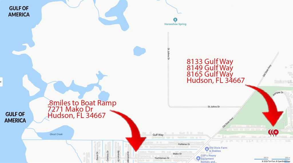 8133 Gulf Way Hudson, FL 34667 - Photo 10 of 10 a picture of a wall with a white wall and a picture of a sign