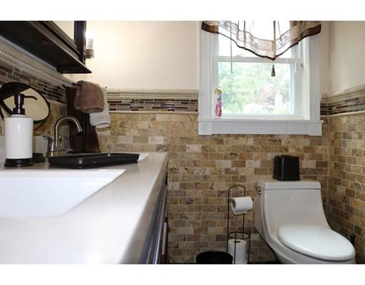 80 Bevier Street Springfield, MA 01107 - Photo 15 of 24 a bathroom with a toilet a sink and a mirror