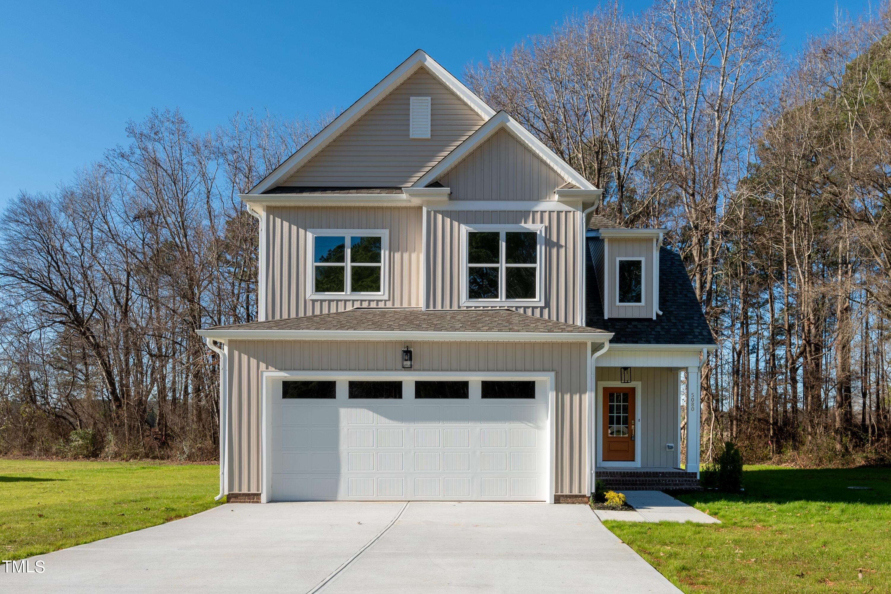 5080 Frazier Road Middlesex, NC 27557 - Photo 3 of 39 a front view of a house with a yard