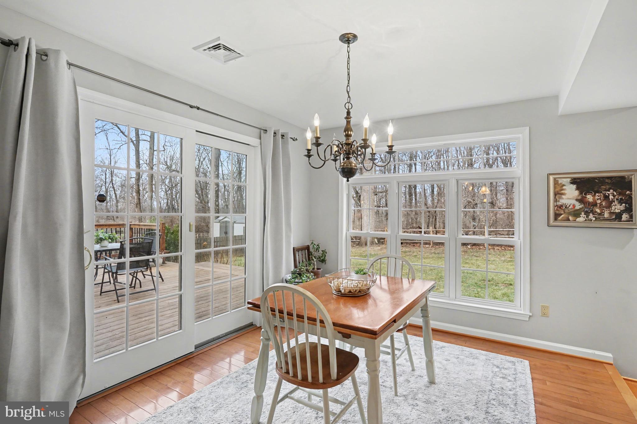 219 Twining Road Lansdale, PA 19446 - Photo 15 of 39 a view of a dining room with furniture wooden floor and chandelier