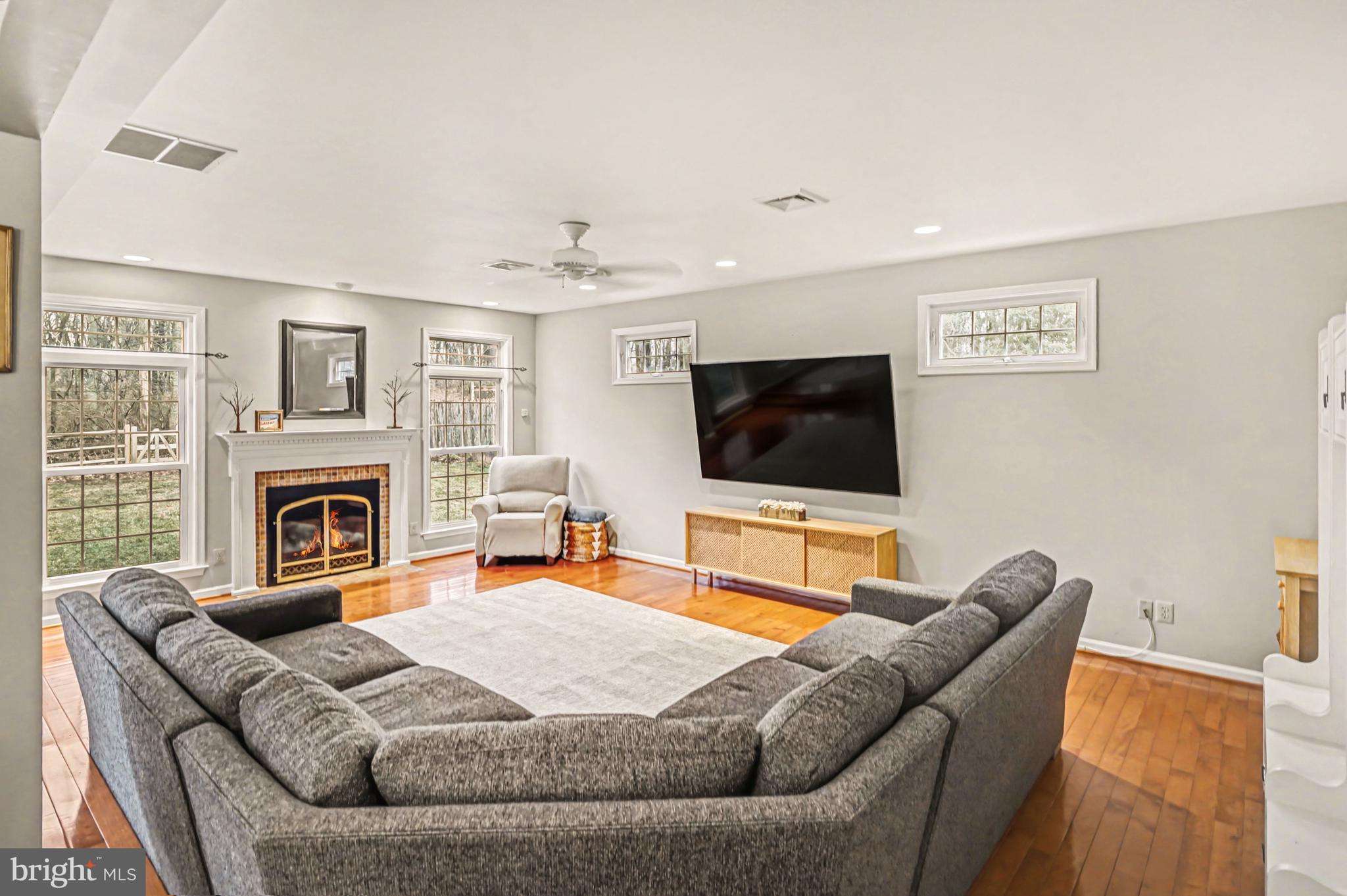219 Twining Road Lansdale, PA 19446 - Photo 18 of 39 a living room with furniture and a flat screen tv