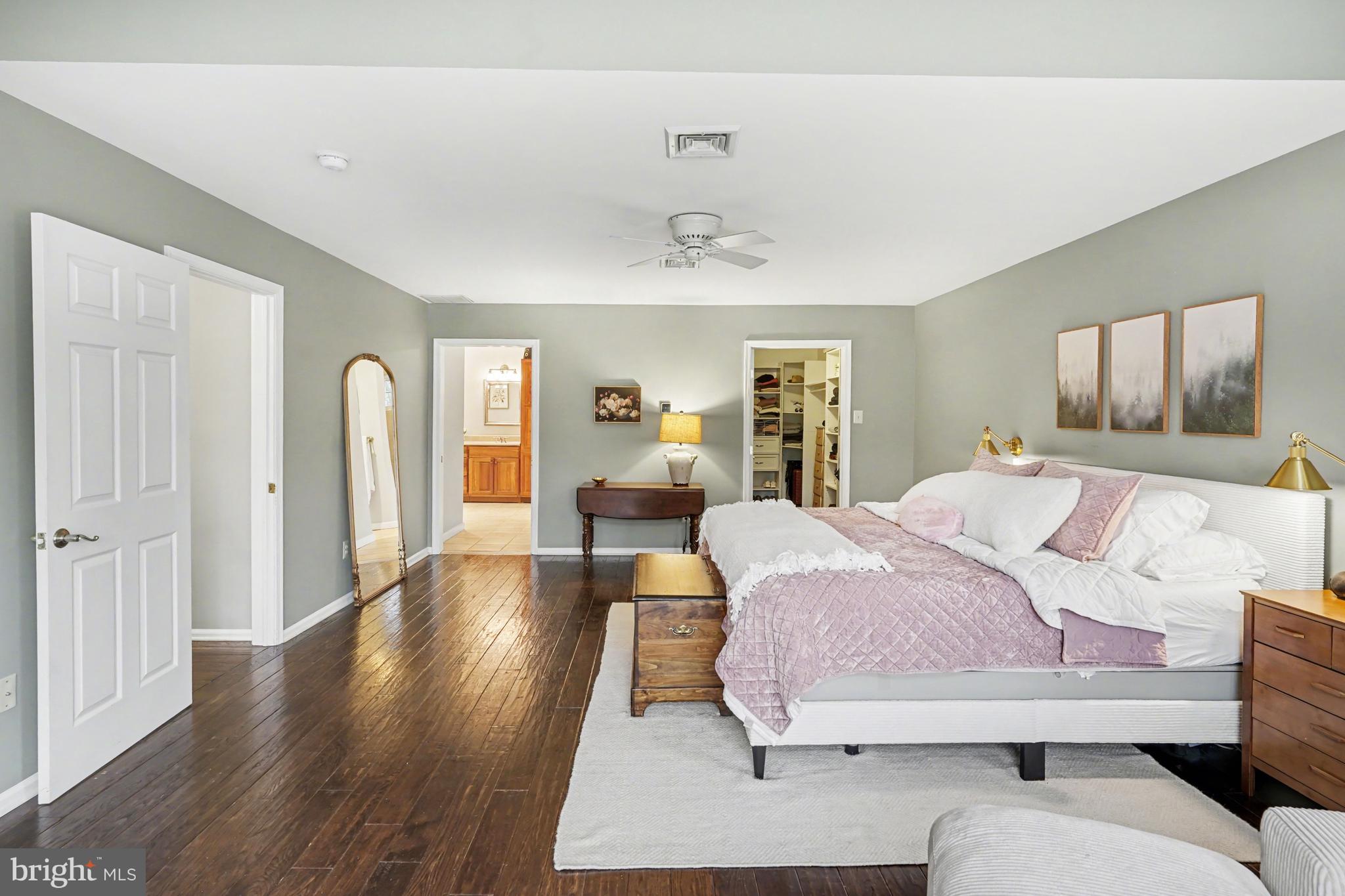 219 Twining Road Lansdale, PA 19446 - Photo 21 of 39 a bedroom with a bed and wooden floor
