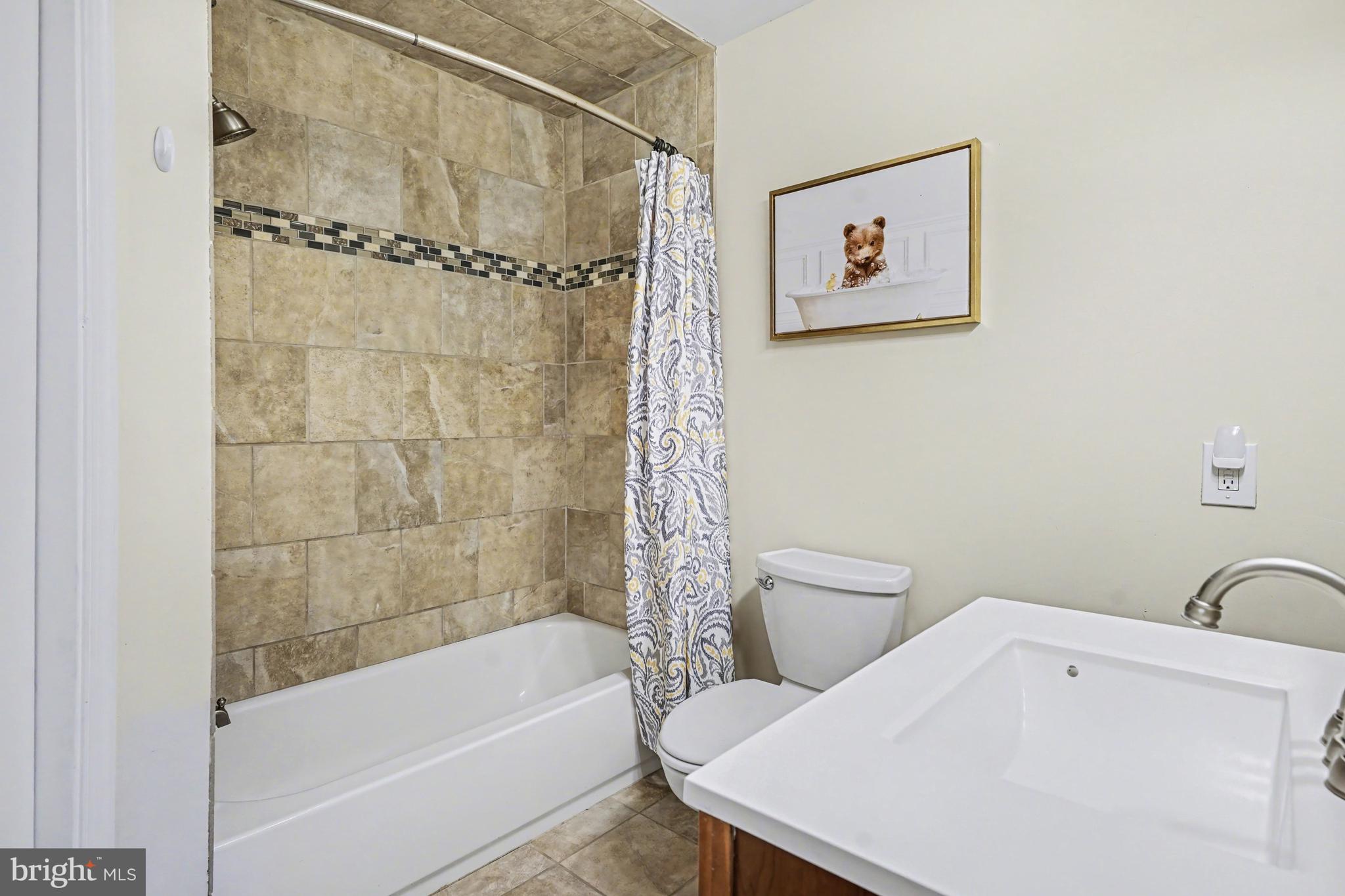 219 Twining Road Lansdale, PA 19446 - Photo 29 of 39 a bathroom with a bathtub and a shower