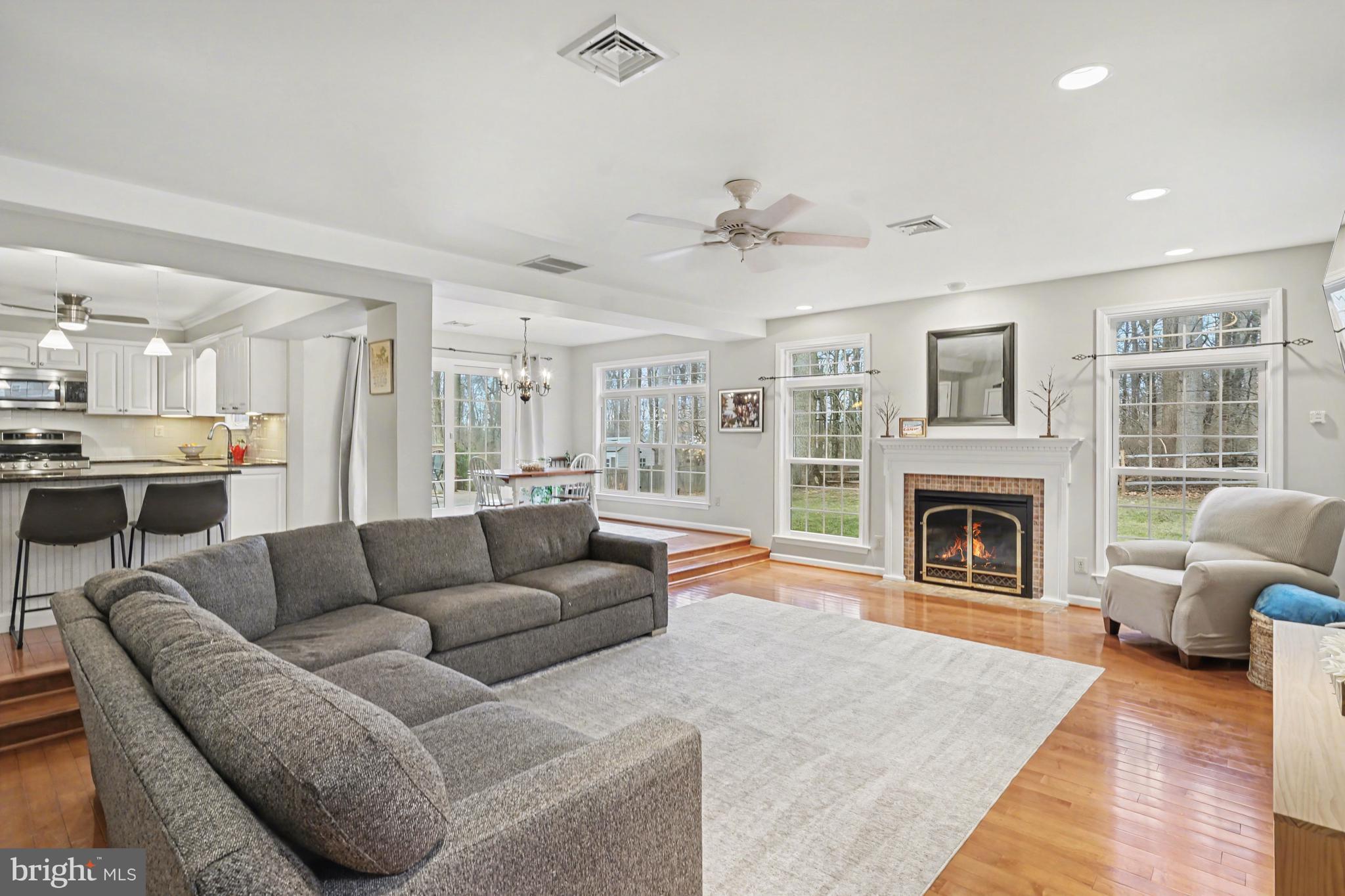 219 Twining Road Lansdale, PA 19446 - Photo 6 of 39 a living room with furniture and a fireplace