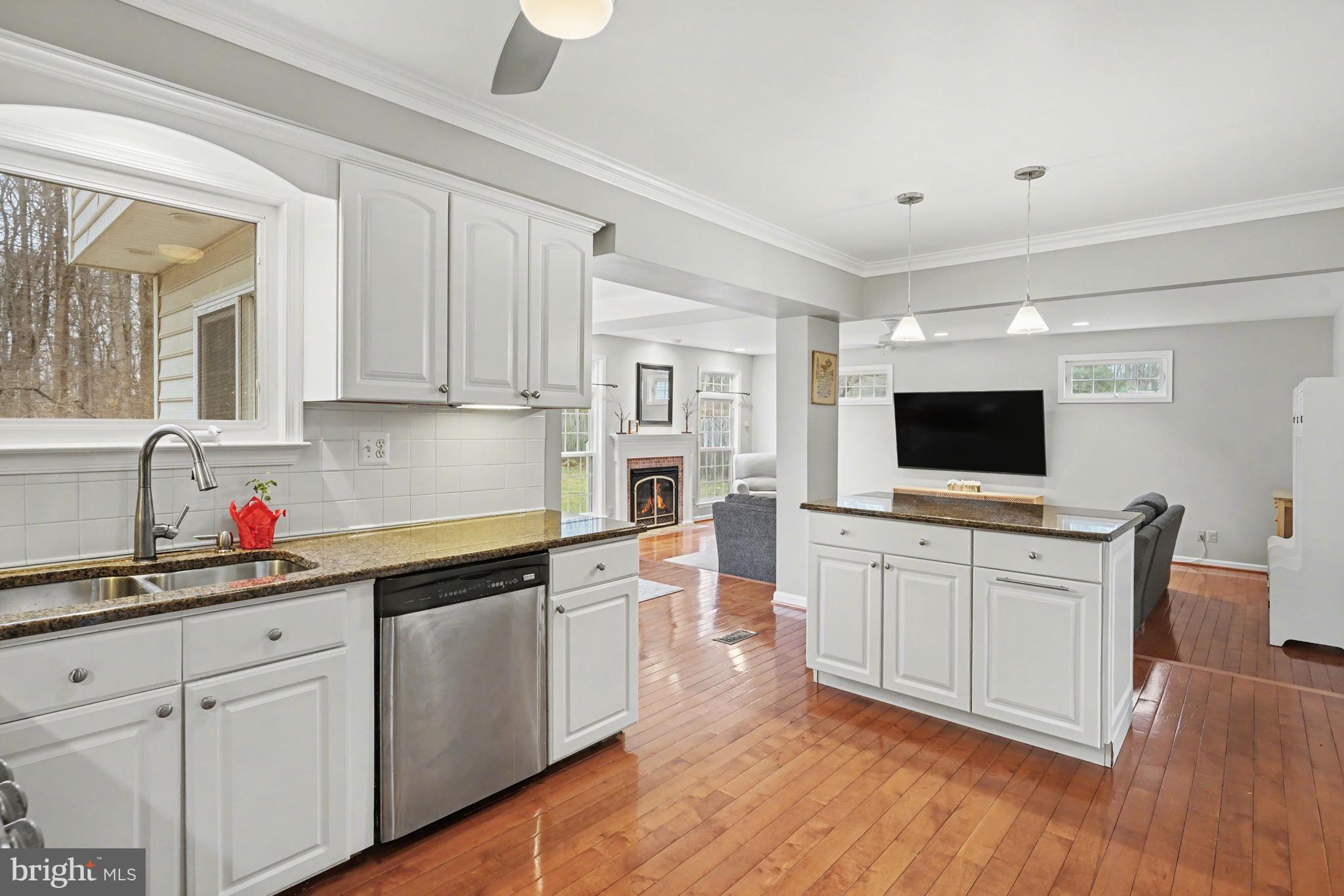 219 Twining Road Lansdale, PA 19446 - Photo 7 of 39 a kitchen with cabinets a sink and a stove