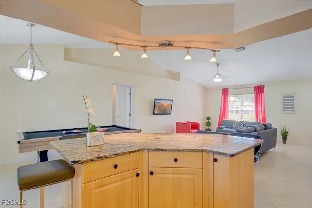 a kitchen with sink and a table