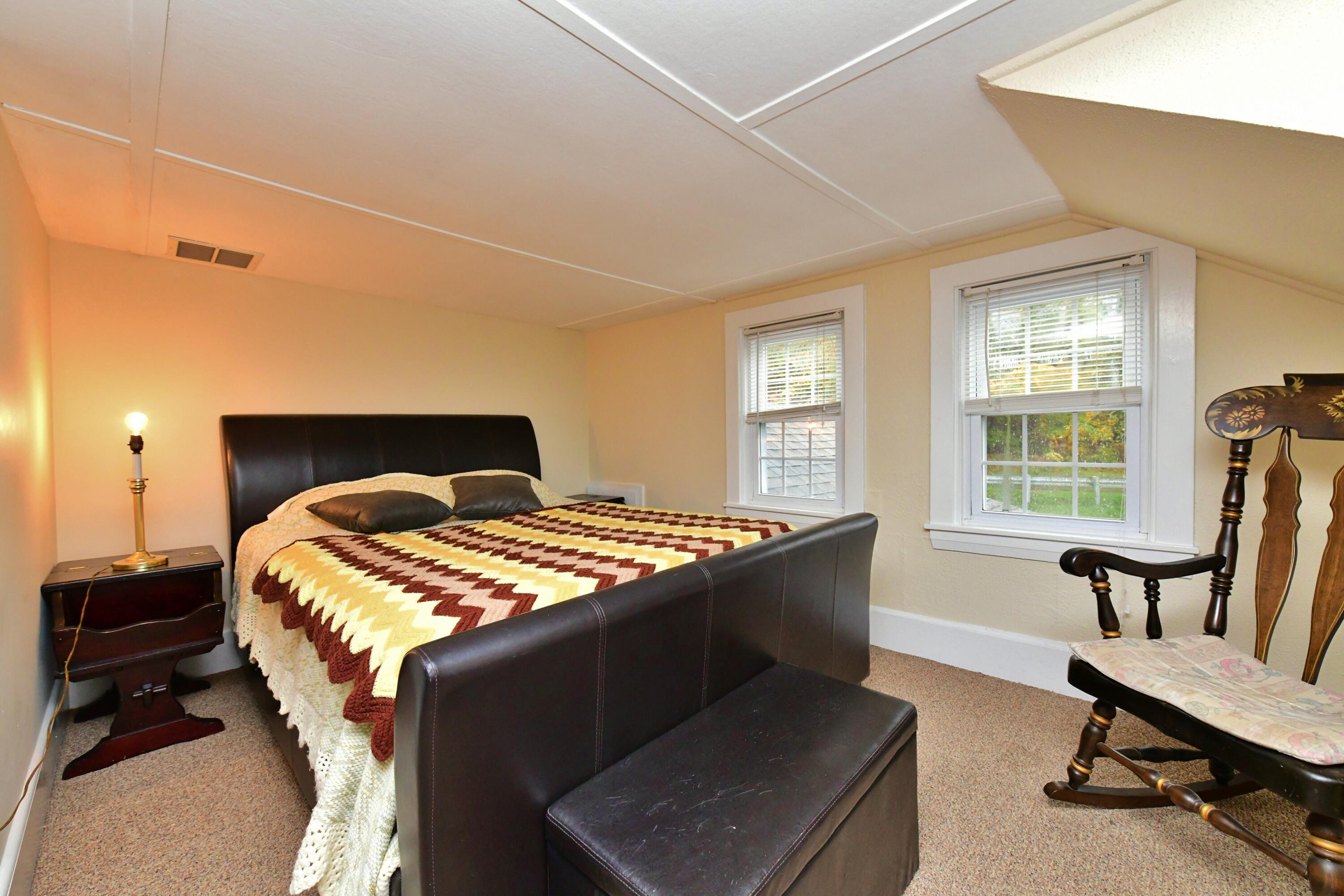6 Bournedale Road, Unit 6B 2 Buzzards Bay, MA 02532 - Photo 13 of 36 a bedroom with bed and windows