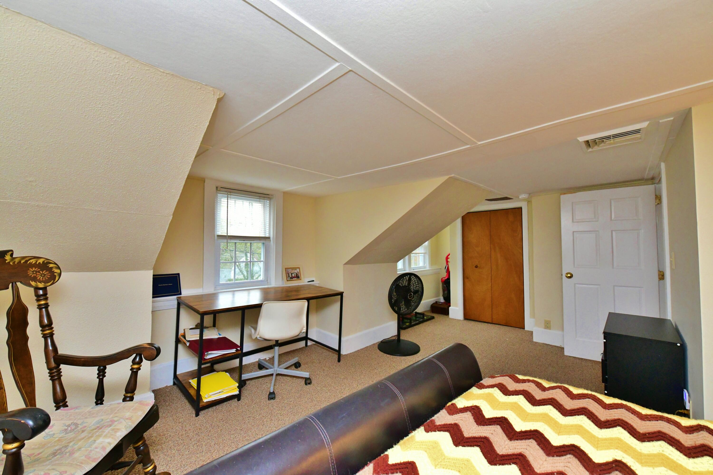 6 Bournedale Road, Unit 6B 2 Buzzards Bay, MA 02532 - Photo 15 of 36 a living room with furniture and a table