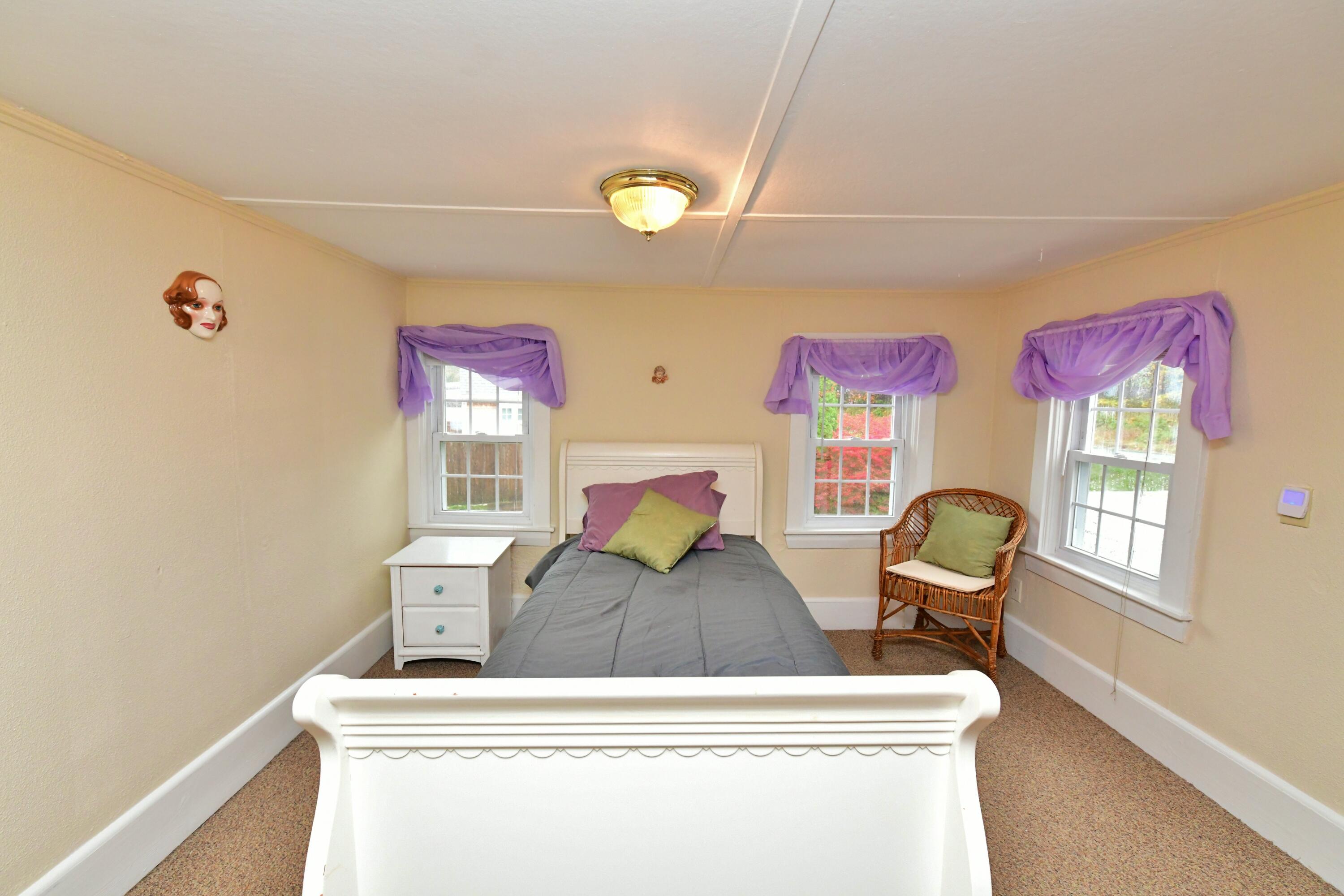 6 Bournedale Road, Unit 6B 2 Buzzards Bay, MA 02532 - Photo 19 of 36 a living room with furniture and a window