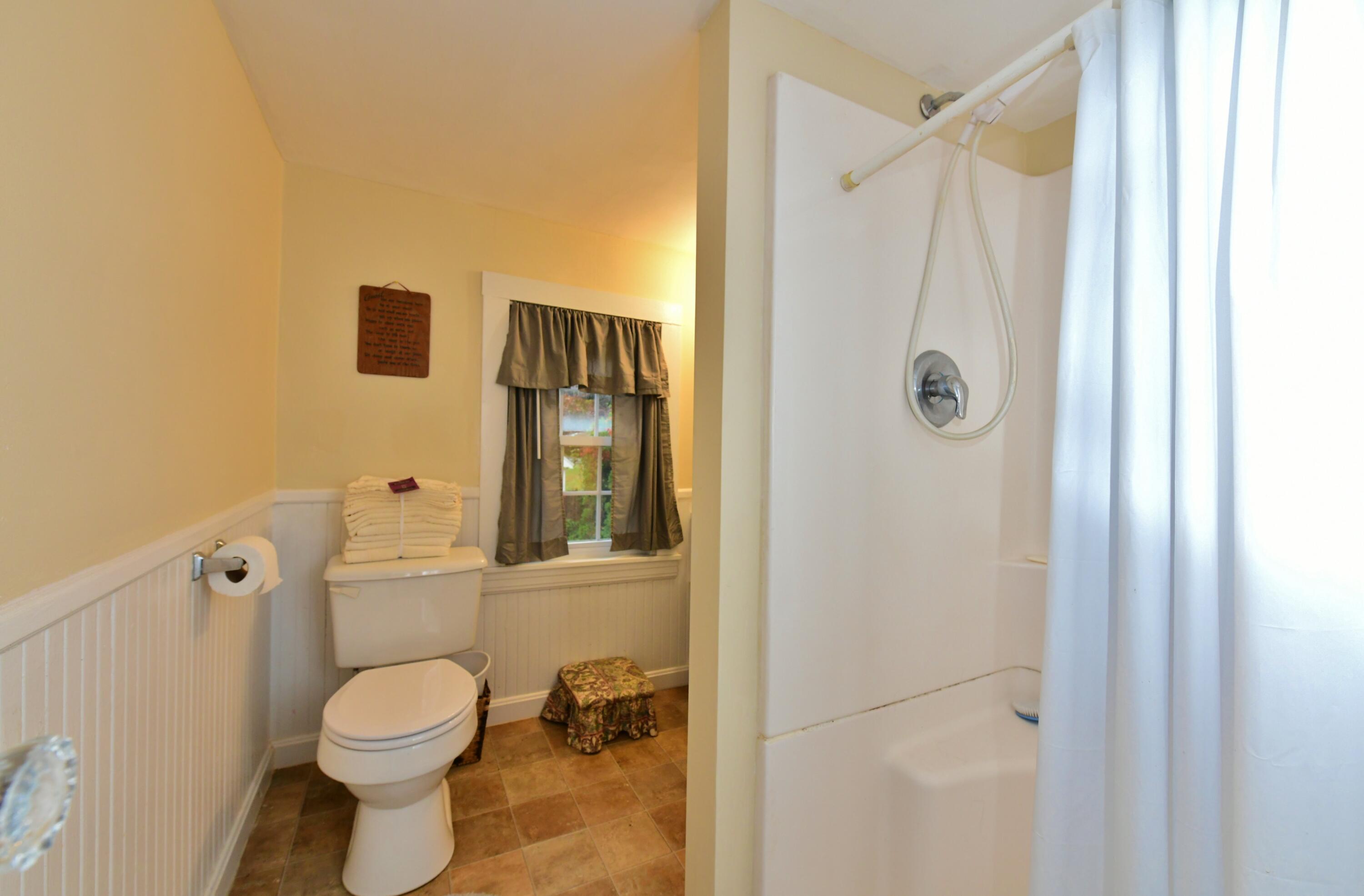 6 Bournedale Road, Unit 6B 2 Buzzards Bay, MA 02532 - Photo 21 of 36 a bathroom with a toilet and a shower
