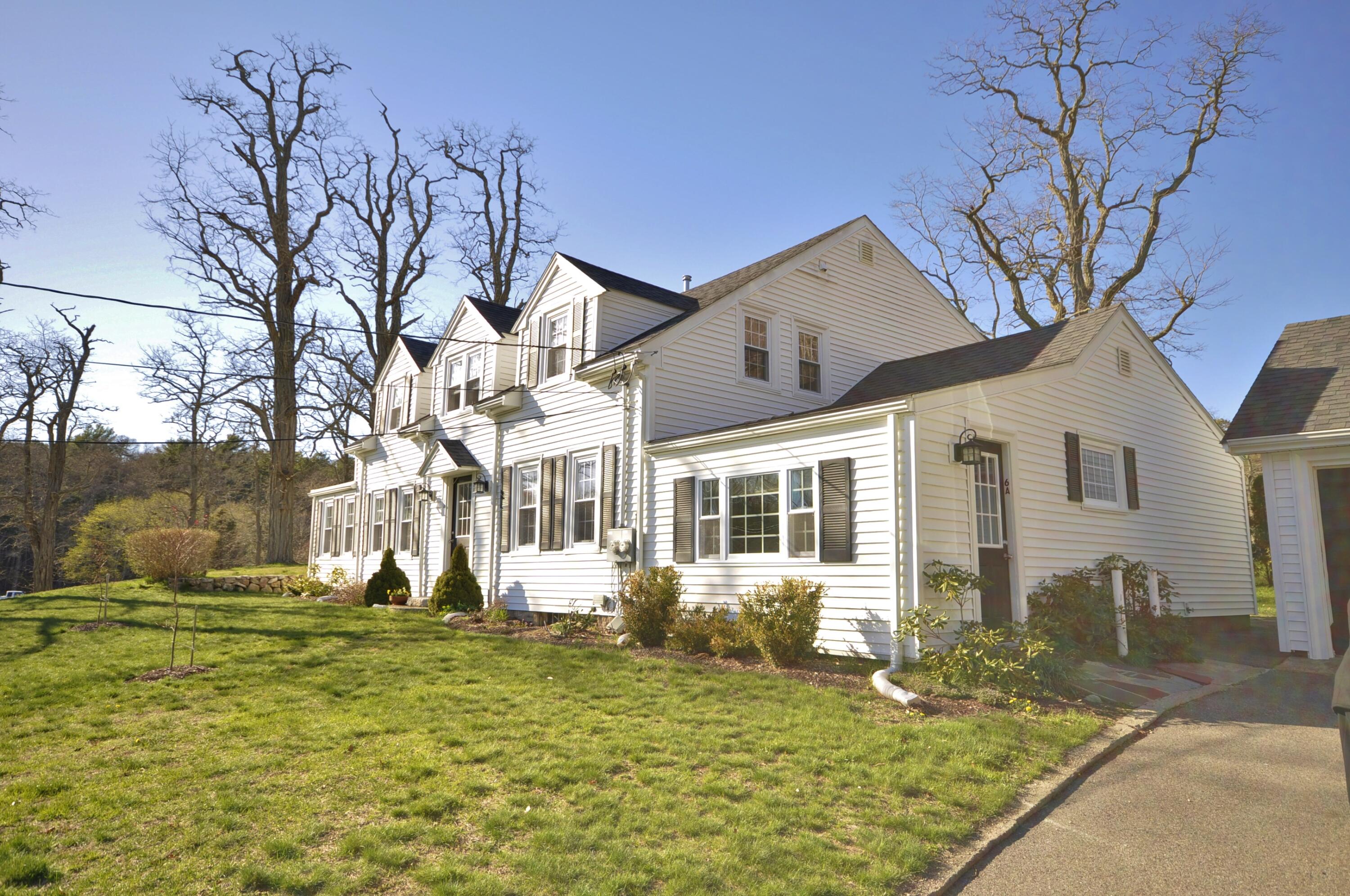 6 Bournedale Road, Unit 6B 2 Buzzards Bay, MA 02532 - Photo 35 of 36 a front view of a house with garden