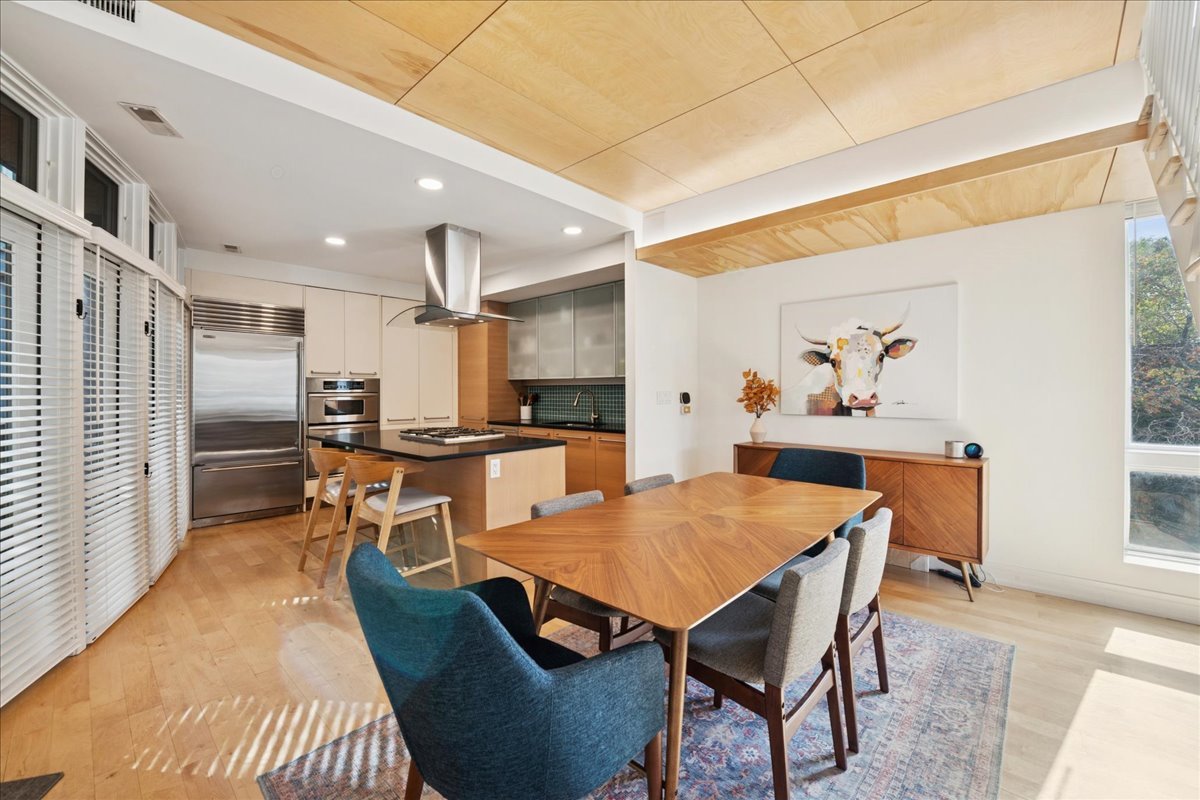 1915 North Damen Avenue, Unit A Chicago, IL 60647 - Photo 8 of 26 a view of a dining room with furniture