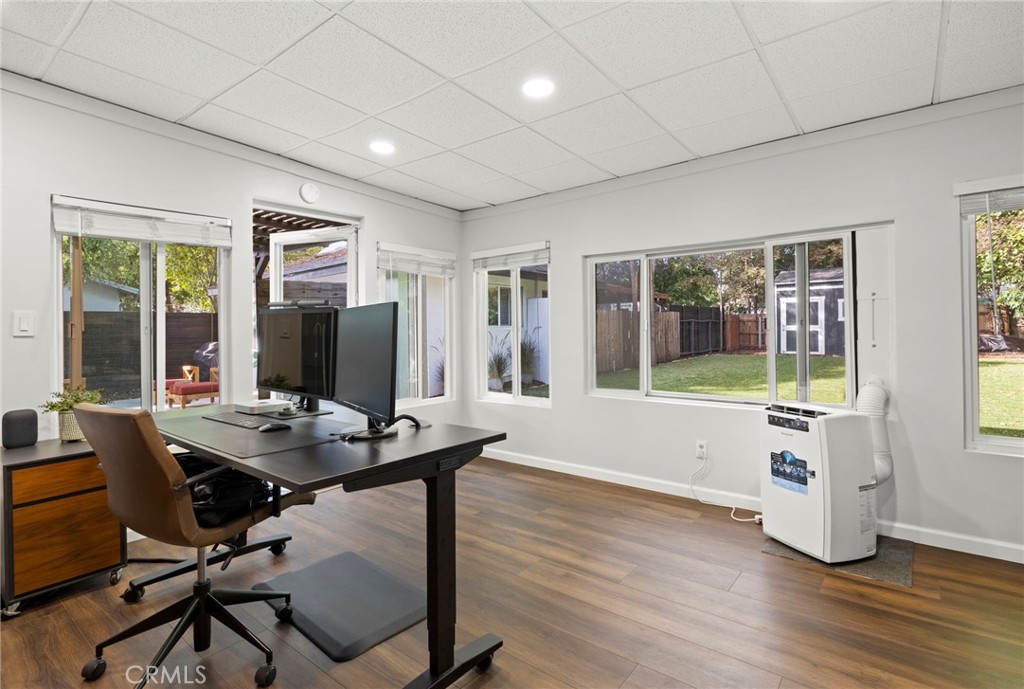 301 Park Road Ojai, CA 93023 - Photo 16 of 26 a view of a workspace with furniture and a table