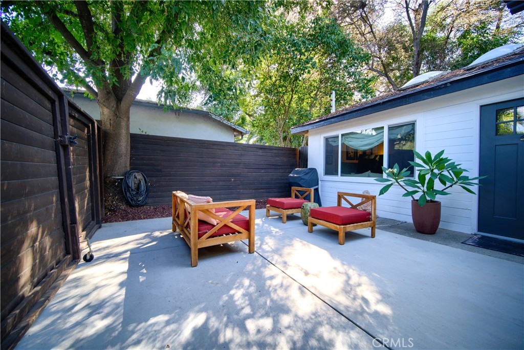 301 Park Road Ojai, CA 93023 - Photo 18 of 26 a backyard of a house with outdoor seating