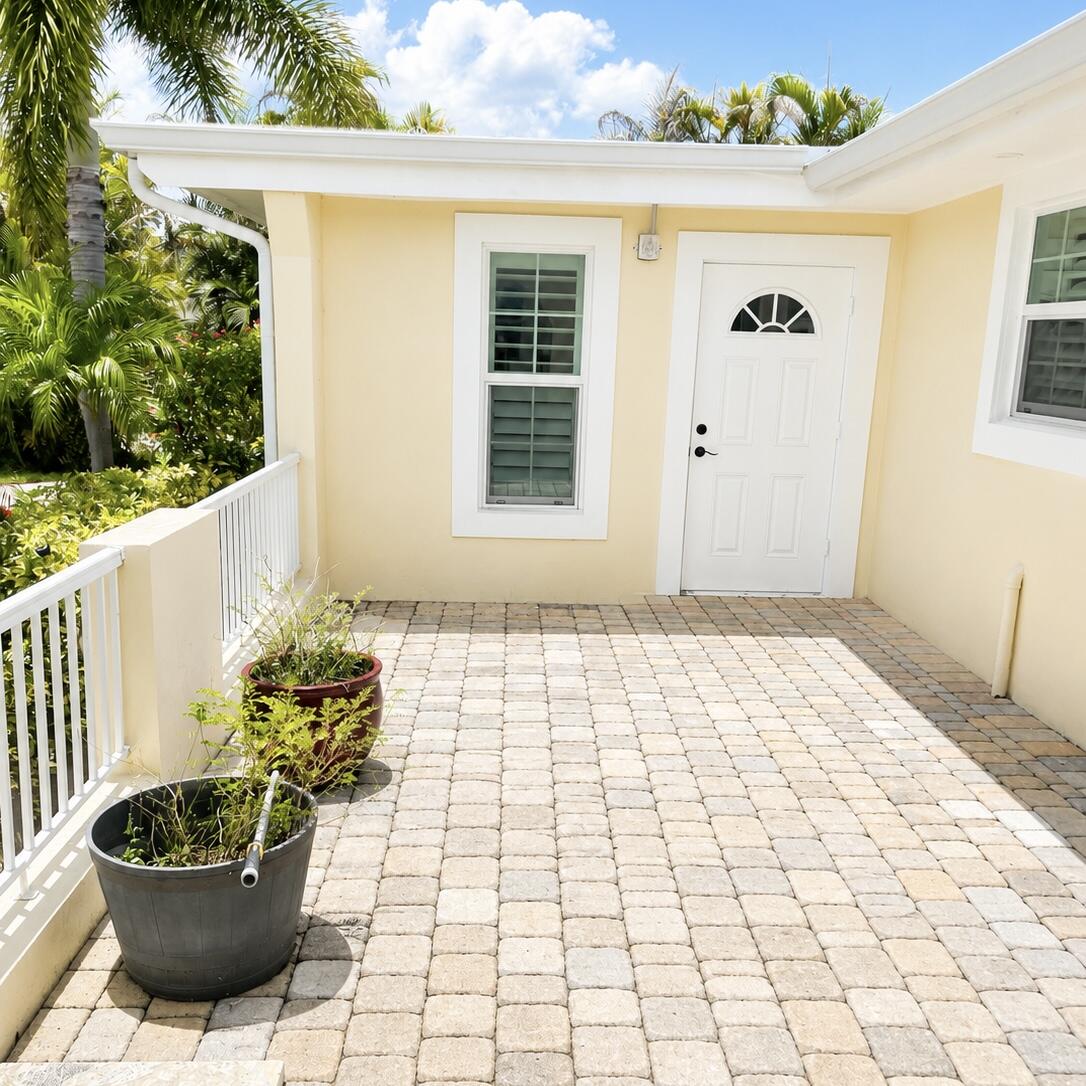 1023 Northwest Spruce Ridge Drive Stuart, FL 34994 - Photo 5 of 33 Front Patio