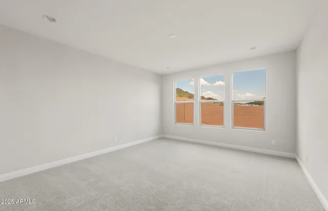 a view of a storage & utility room with a window